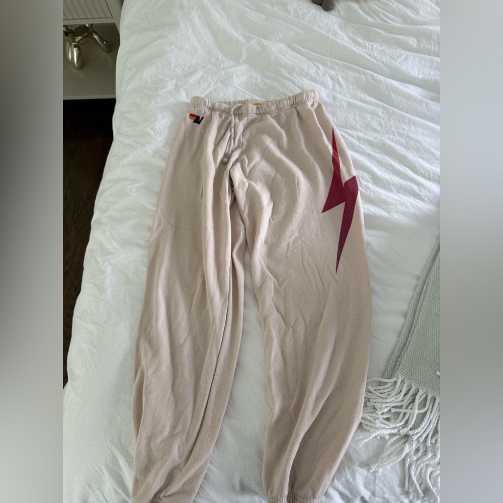 Aviator Nation Light Beige Sweatpants with Burgundy Lightning Bolt